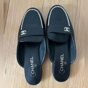 Chanel black leather pearl mule slides